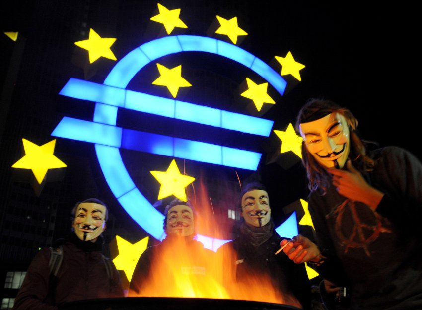 Occupy Wall Street protesters in Frankfurt wearing masks from the movie "V"